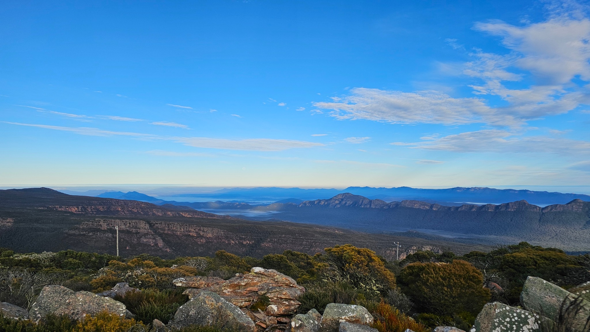 Mountain panorama beneath a clear blue sky