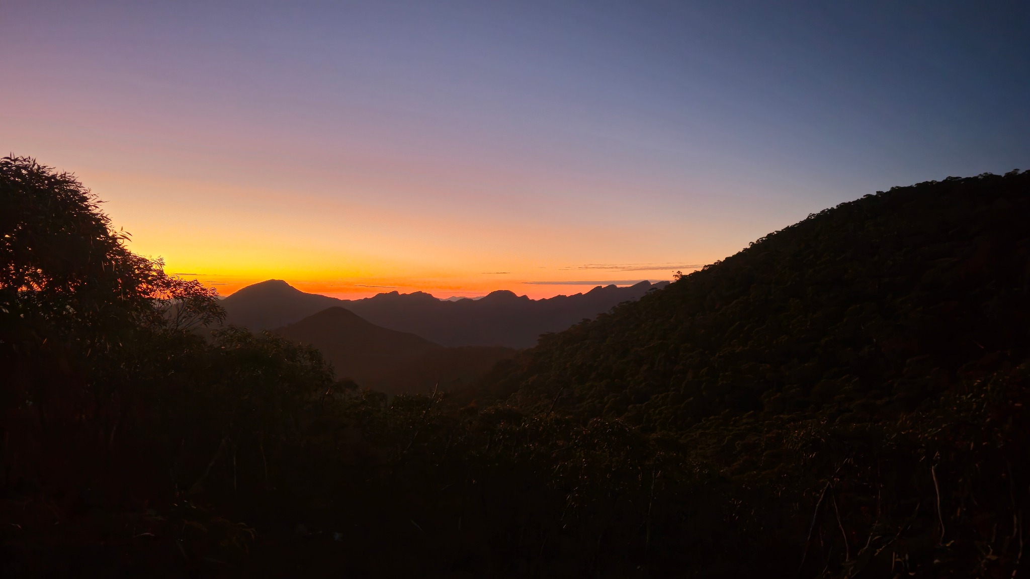 Mountain silhouettes at sunset