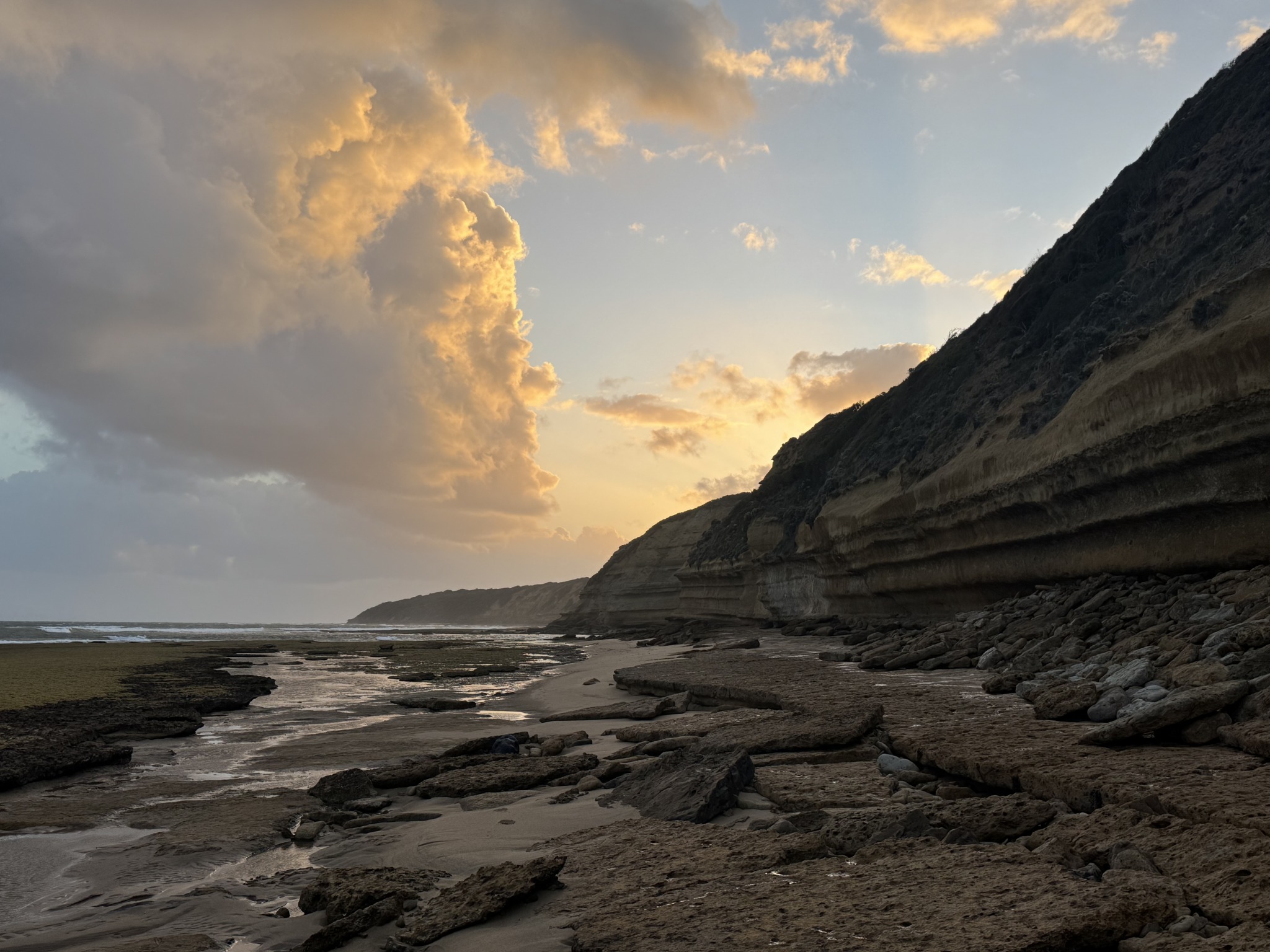 Coastal cliffs beneath dramatic clouds
