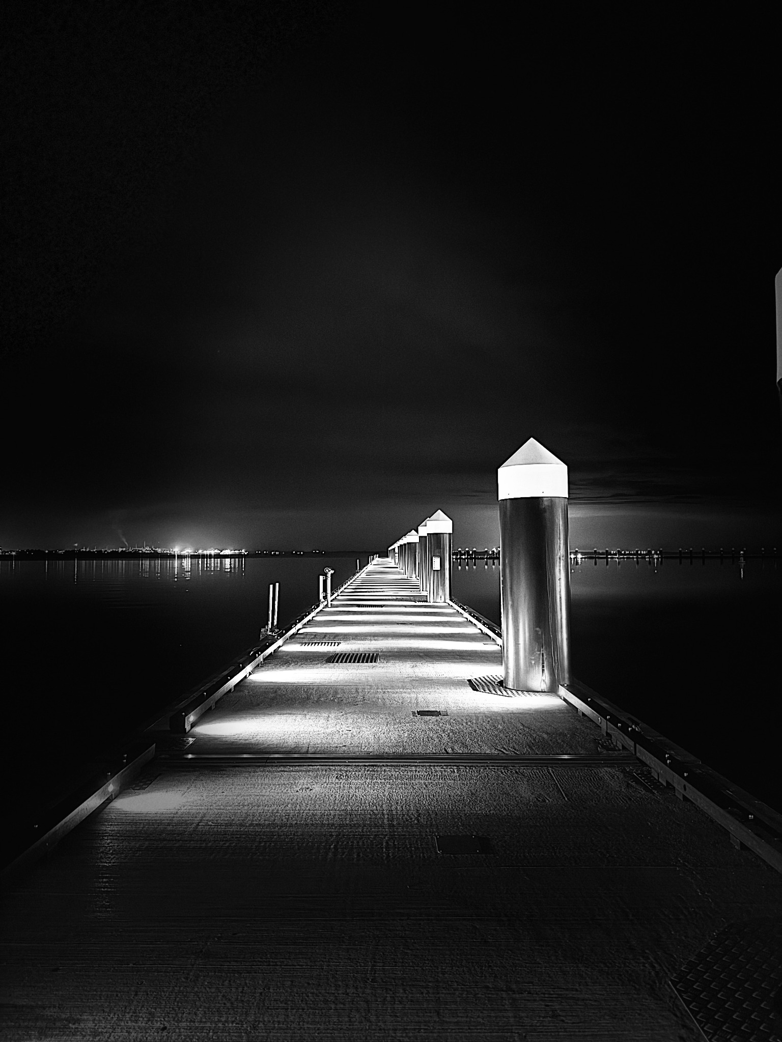 Black and white city scene with crane